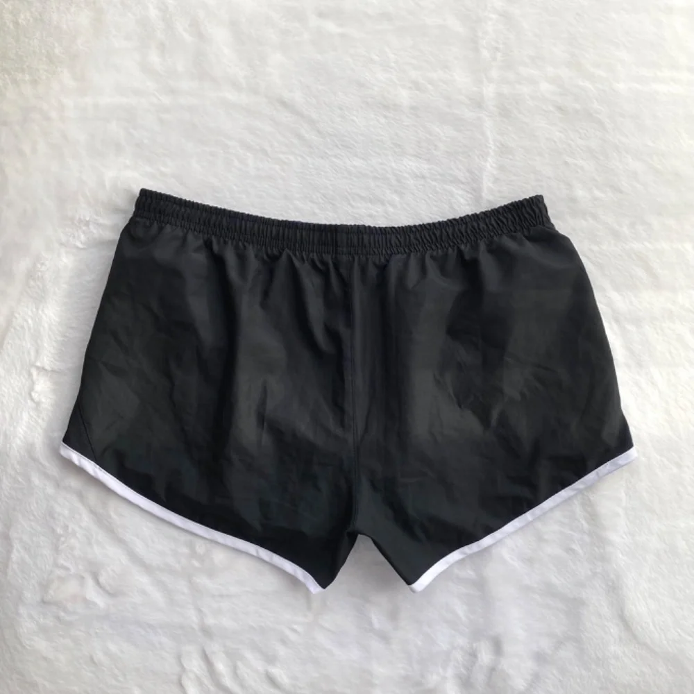 Nike Dri-Fit Running Shorts in Black and White - Picture 2 of 13